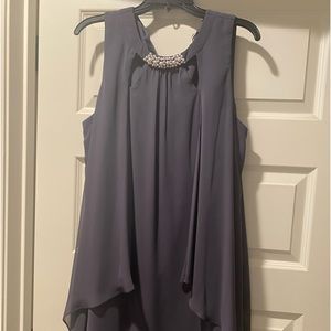 Ignite Evenings
Trapeze silhouette
Crew neckline with beaded trim
Sleeveless